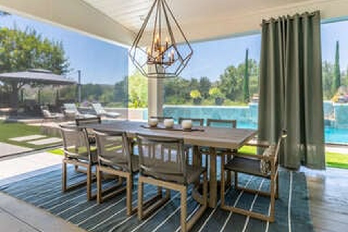 Outdoor patio drapery and shades by Budget Blinds